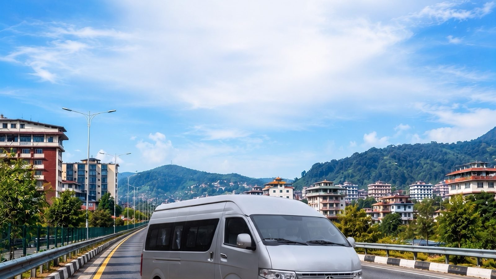 Silver electric van on a city highway
